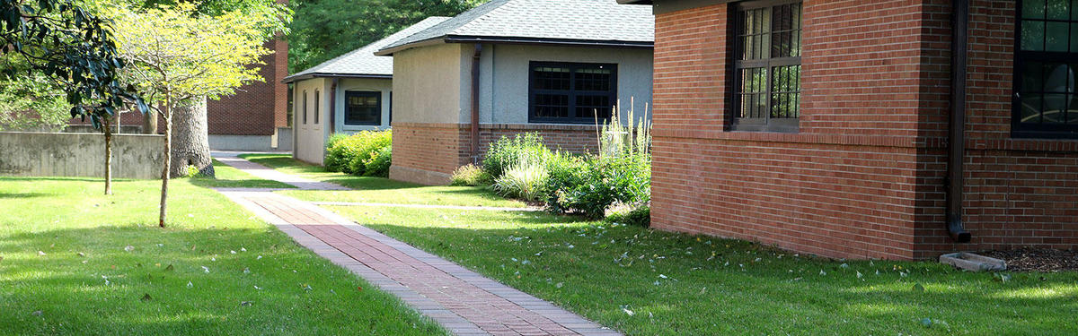 view of the legacy walk behind the Welcome Center on campus